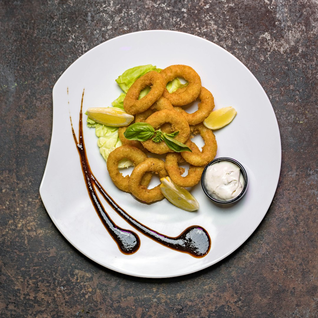 Fritto di calamari – Photo by Racha Debbech on Unsplash